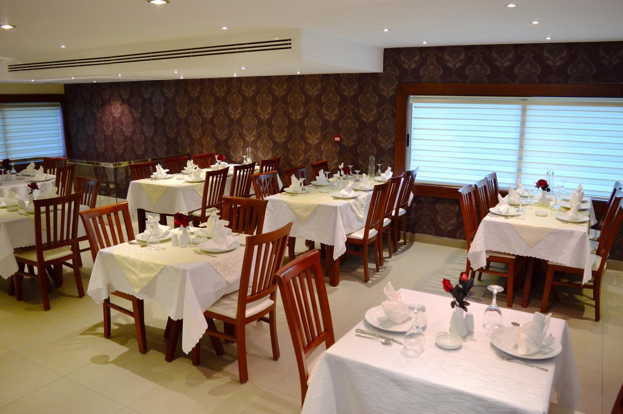 President Hotel Amman Esterno foto
